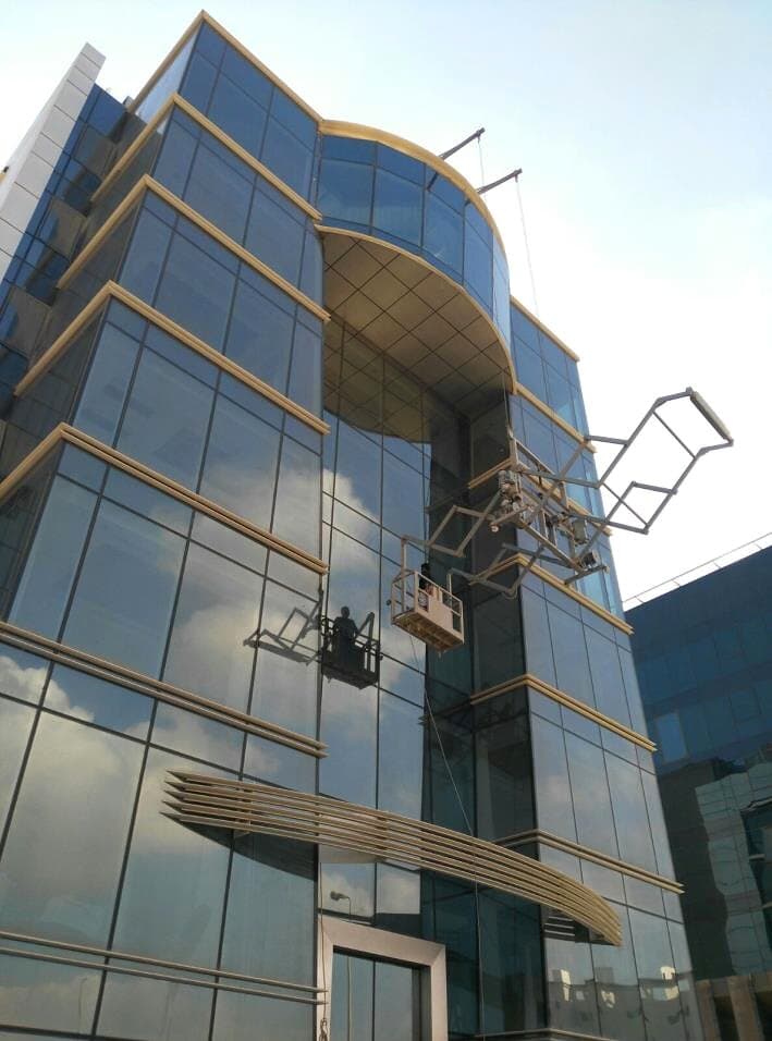 Suspended cradle working on the façade, EMEC
