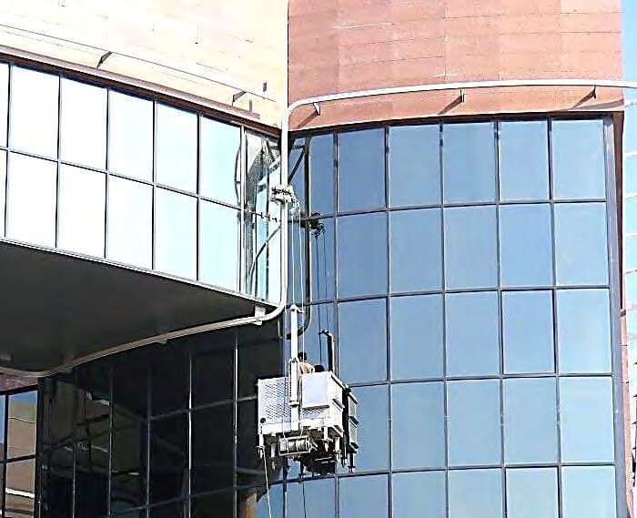 Suspended cradle working on the façade, GASTEC