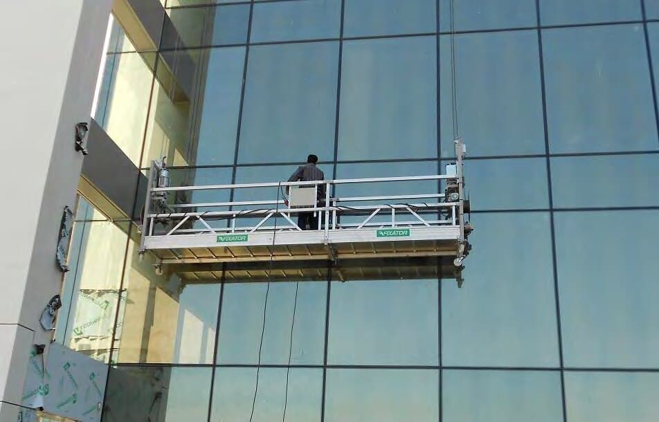 Suspended cradle working on the façade, Nestlé Egypt