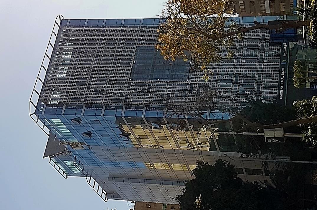 Suspended cradle working on the façade, United National Bank