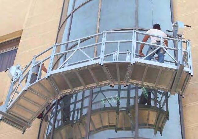 Suspended cradle working on the façade, Wahba Factory