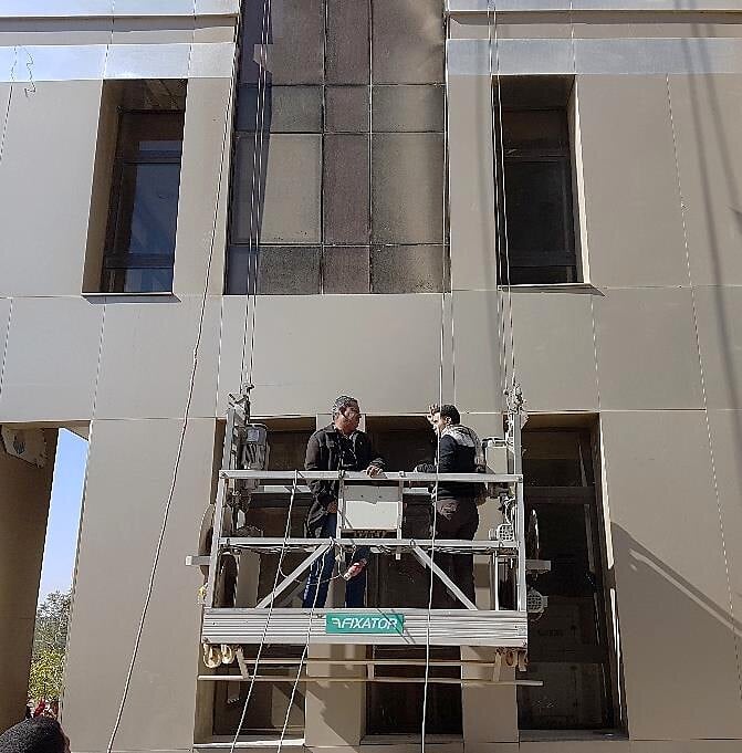 Suspended cradle working on the façade, EPROM