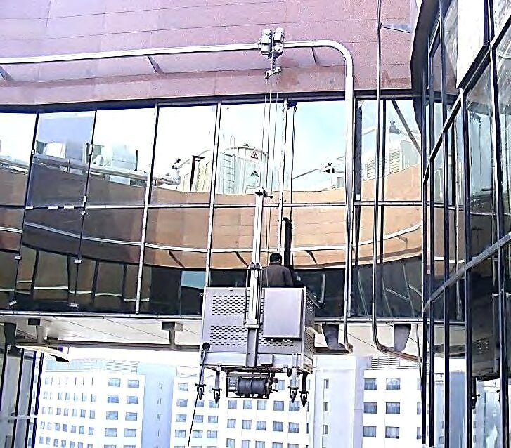 Suspended cradle working on the façade, GASTEC